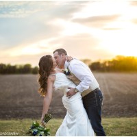 epic bride and groom sunset photo with a kissing dip in wichita kansas