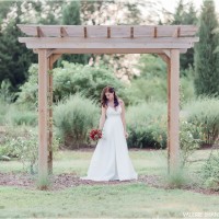 summer bridal session with a red rose bouquet in Wichita kansas wedding photographer valerie shannon photography